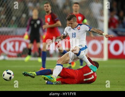 JURAJ KUCKA & JAMIE VARDY Slowakei ENGLAND EURO 2016 GR STADE GEOFFROY GUICHARD Saint-Etienne Frankreich 20 Juni 2016 Stockfoto