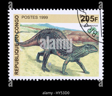 Briefmarke aus dem Kongo, die Darstellung eines Scutellosaurusdinosaur Stockfoto