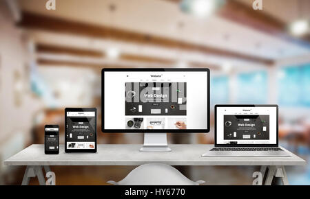 Web-Design-Studio-Förderung auf mehreren Geräten. Ansprechende Website auf Computer-Display, Notebook, Tablet und Smartphone. Modernes, klares Design mit cle Stockfoto
