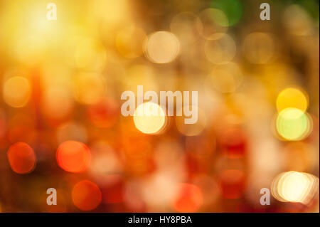 Gelbe und rote Bokeh Hintergrund erstellt von Neonröhren Stockfoto