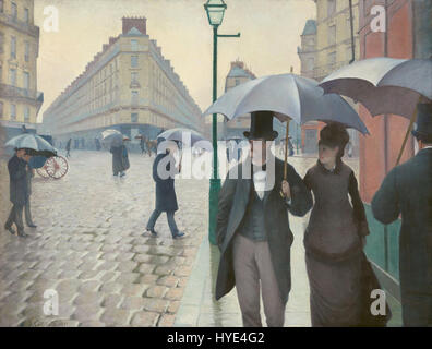 „Paris Street; Rainy Day“ von Gustave Caillebotte fängt einen regnerischen Tag in Paris ein und zeigt die geschäftige Stadtszene mit Figuren, die unter Sonnenschirmen entlang der Straße spazieren. Das Gemälde unterstreicht Caillebottes Know-how, das moderne Stadtleben und die Auswirkungen von Licht und Wetter auf urbane Landschaften einzufangen. Stockfoto