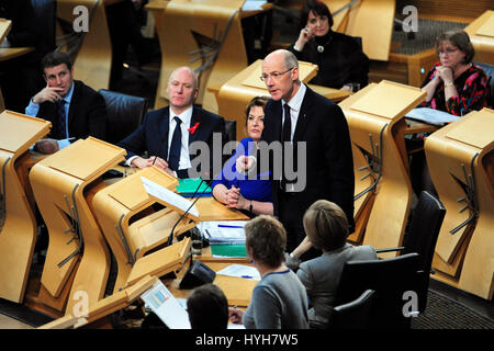 John Swinney, Schottlands stellvertretende erste Minister und ein SNP-Vertreter in der Smith-Commission on mehr Befugnisse für Schottland, macht eine formelle Erklärung in das schottische Parlament auf die Reaktion der Regierung an die Kommission Stockfoto