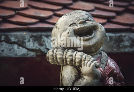Kleine lachende Buddha - Bangkok, Thailand Stockfoto
