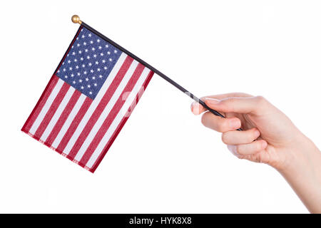 Hand, die amerikanische Flagge auf weißem Hintergrund Stockfoto