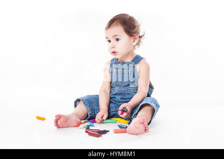 Babymädchen schreiben Stockfoto