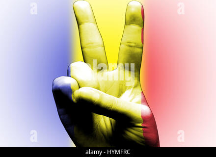 V-Zeichen handgemalt mit rumänische Flagge über der Rumänien-Flagge Stockfoto