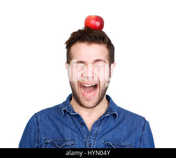 Porträt von Angst junger Mann mit Apfel auf Kopf hautnah Stockfoto