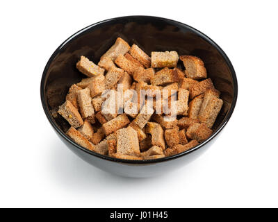 Trocken gebackenes Brot in Platte isoliert auf weißem Hintergrund Stockfoto