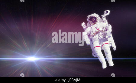 Astronaut in einem EMU (Extravehicular Mobility Unit) vor einem hellen Stern im Deep Space (Elemente des Bildes sind von der NASA eingerichtet) 002 Stockfoto