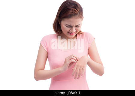 Nahaufnahme der weibliche Hände mit Schmerzen am Handgelenk. Isoliert auf weiss. Stockfoto