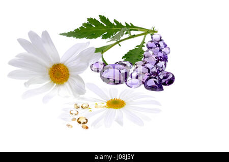 Crystal-Therapie mit Edelsteinen und weißem Hintergrund. Amethyst und gelbe Topas. Stockfoto