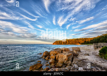 Sonnenuntergang über der Waschfrau, Bendalong Strand, Shoalhaven, Südküste, New South Wales, NSW, Australien Stockfoto