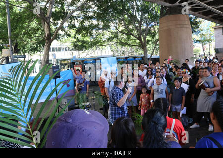 Wesley Mission organisiert eine öffentliche Prozession um den triumphalen Einzug Jesu in Jerusalem am Palmsonntag am Circular Quay, Sydney, Australien nachspielen. Stockfoto