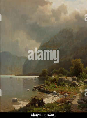 Adolf Chwalas Gemälde „Na brehu jezera“ (am Ufer des Sees) zeigt eine ruhige Seeszene und zeigt die Ruhe der Natur. Das Werk aus dem 19. Jahrhundert fängt die reflektierenden Qualitäten des Wassers, die üppige Landschaft und die ruhige Atmosphäre ein. Stockfoto
