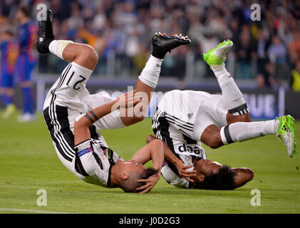 Torin, Italien. 11. April 2017. Juventus Turin Paulo Dybala (L) feiert scoring mit Juan Cuadrato während der UEFA Champions League Viertelfinale Hinspiel Partie zwischen Juventus und Barcelona in Turin, Italien, 11. April 2017. Juventus gewann 3: 0. Bildnachweis: Alberto Lingria/Xinhua/Alamy Live-Nachrichten Stockfoto