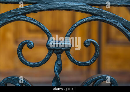 Schmiedeeiserne arbeiten auf einem Zaun in Charleston, South Carolina. Stockfoto