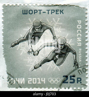 GOMEL, WEIßRUSSLAND, 13. APRIL 2017. Briefmarke gedruckt in Russland zeigt Bild der Olympischen Winterspiele 2014, offiziell genannt XXII Olympische Winterspiele, wer Stockfoto