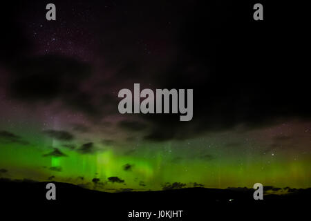 Aurora Borealis gesehen von der A82 durch Rannoch Moor, Schottisches Hochland. Stockfoto