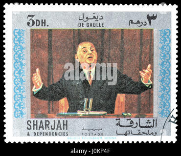 Briefmarke gedruckt von Sharjah, das General de Gaulle zeigt abgebrochen. Stockfoto