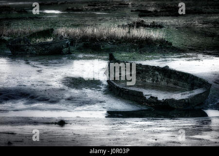 Boot-Wracks in Löcher Bay, Poole, Dorset, England, UK Stockfoto