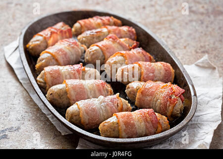 Schweine in Decke Snack auf Platte Stockfoto