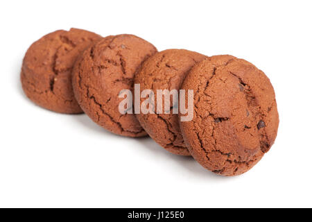 Gruppe von Braun Cookies isoliert auf weiss Stockfoto