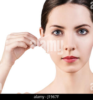 Frau ihre alte trockenen Haut vom Gesicht abnehmen Stockfoto