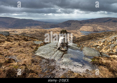 Denkmal für zwei Besatzungen, die ihr Leben verloren, wenn ihr F-111E Flugzeug stürzte auf Criagnaw, Galloway Hills, Schottland 19. Dezember 1979 Stockfoto