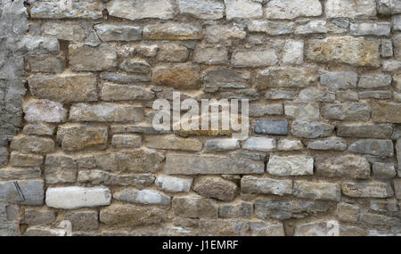 Unverputzten Wand aus Natursteinen Stockfoto