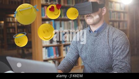 Digitalen Verbund des Mannes betrachten Emojis auf VR-Brillen Stockfoto