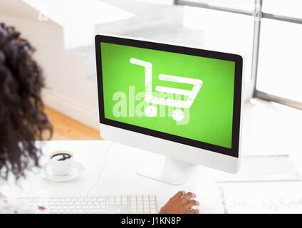 Digital Composite Person Shopping Trolley Symbol Computer mit Stockfoto