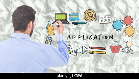 Digitalen Verbund der Rückseite Geschäftsmann mit Marker gegen Anwendung Kritzeleien und Papier Stockfoto