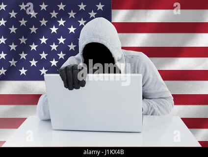 Digitalen Verbund aus anonymen Verbrecher in Kapuze mit Laptop vor amerikanische Flagge Stockfoto