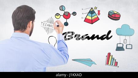 Digitalen Verbund der Rückseite Geschäftsmann mit Marker gegen Marke Kritzeleien und weiße Wand Stockfoto