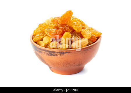 Keramikschale mit goldenen Rosinen auf weiß Stockfoto