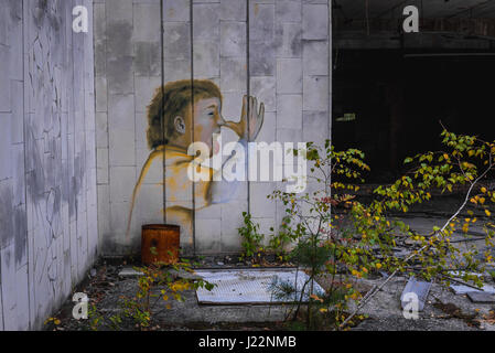 Graffiti an der Wand des Einkaufszentrums in Pripyat ghost Stadt Chernobyl Nuclear Power Plant Zone der Entfremdung in der Ukraine Stockfoto