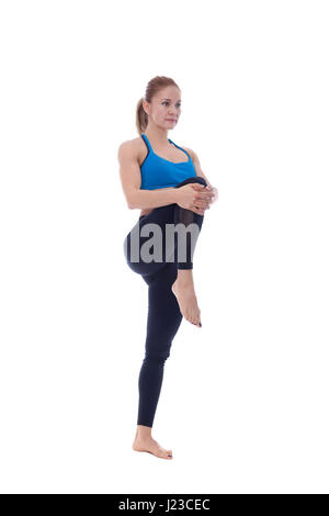 Stretching Pose mit einem professionellen Trainer ausgeführt. Stockfoto