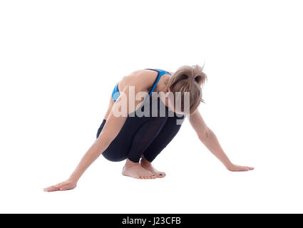 Stretching Pose mit einem professionellen Trainer ausgeführt. Stockfoto