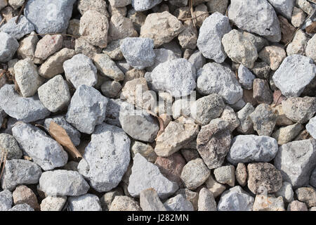 Steinen oder Kies Textur draußen fotografiert. Stockfoto