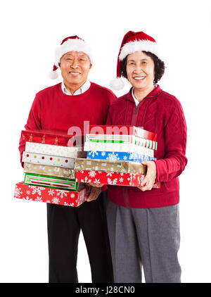 Ein Schuss von senior asiatischen paar tragen Weihnachten präsentiert Weihnachten zu feiern Stockfoto