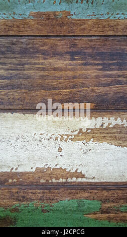 Alten rustikalen hölzernen Planken brettern Hintergrund, Textur, abblätternde Farbe. blau weiß grün braun Farbe. Betonte schäbig Holz. grunge vintage Textur. vertic Stockfoto