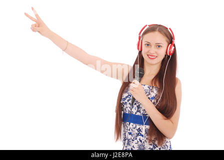 Glückliche junge schöne Mädchen singen mit Mikrofon isoliert auf weißem Hintergrund Stockfoto