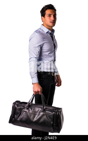 Junger Mann mit großen schwarzen Ledertasche Stockfoto