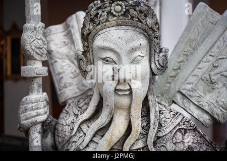 Steinstatue der Mönch im buddhistischen Tempel Wat Pho in Bangkok, Thailand Stockfoto