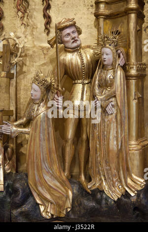 Martyrium der Heiligen Katharina von Alexandrien. Detail des Altars der Heiligen und Märtyrer aus der Chartreuse de Champmol flämischen Renaissance-Bildhauers Jacques de Baerze (1390-1399) auf dem Display in das Musée des Beaux-Arts de Dijon (Museum of Fine Arts) in Dijon, Burgund, Frankreich. Stockfoto