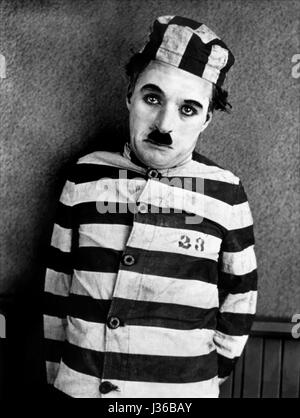 Das Abenteurer-Jahr: 1917 Direktor: Charles Chaplin Charles Chaplin.  Es ist verboten, das Foto aus dem Kontext der Promotion des Films zu reproduzieren. Es muss die Filmgesellschaft und/oder der Fotograf von zugewiesen oder von autorisierten / erlaubt am Set von der Filmgesellschaft gutgeschrieben werden. Nur für redaktionelle Nutzung. Photo12 gewährt keine Persönlichkeitsrechte der Personen vertreten. Stockfoto