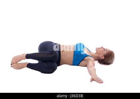 Stretching Pose mit einem professionellen Trainer ausgeführt. Stockfoto