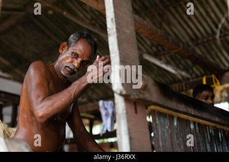 Kokos Fabrikarbeiter in der Nähe von Trivandrum, Kerala Stockfoto