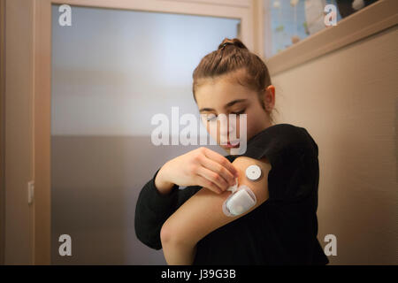 JUGENDLICHE MIT DIABETES Stockfoto