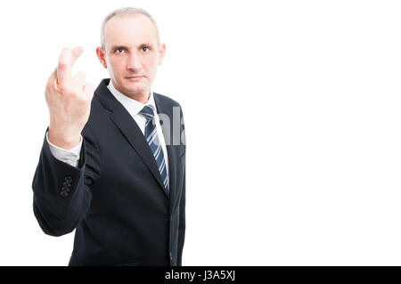 Mann mittleren Alter eleganter machen Finger gekreuzt Geste trägt Anzug und Krawatte isoliert auf weißem Hintergrund mit textfreiraum text Stockfoto